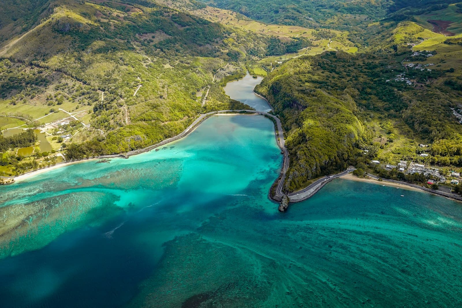 Aerial view of the coast road and peninsula at Le Morne